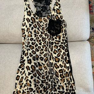 Leopard print top with lace. It is in good condition and very comfortable.